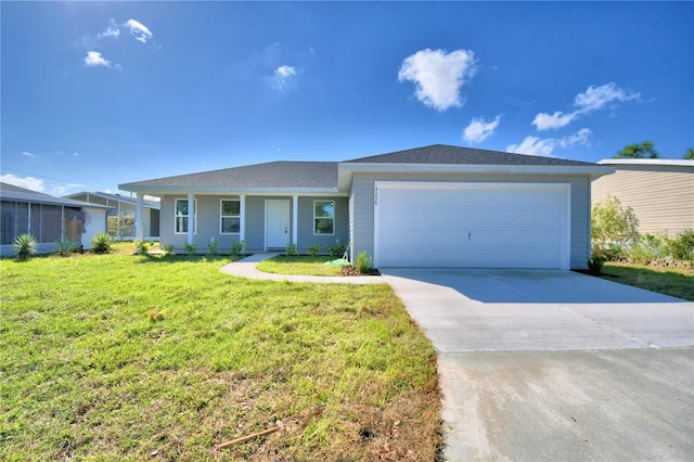 single story home featuring a garage and a front lawn