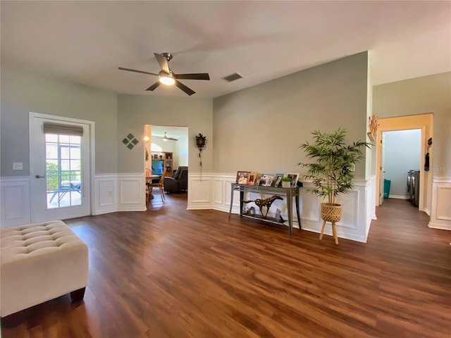 interior space featuring ceiling fan and dark hardwood / wood-style flooring