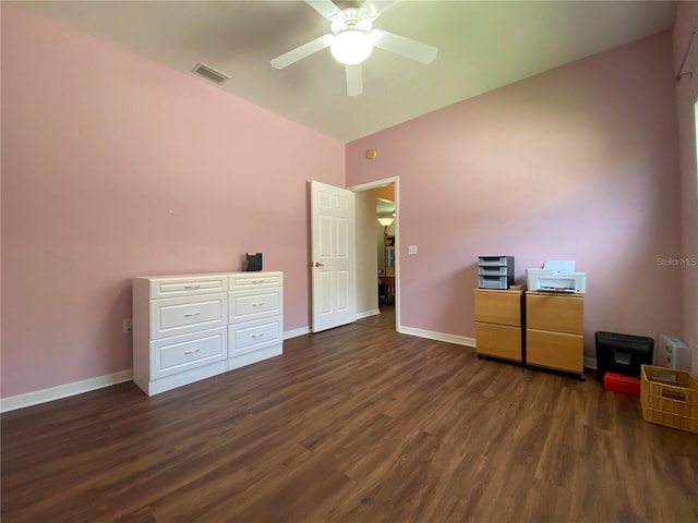 unfurnished bedroom featuring dark wood-type flooring and ceiling fan