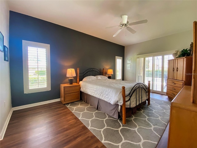 bedroom featuring wood-type flooring, access to outside, and ceiling fan