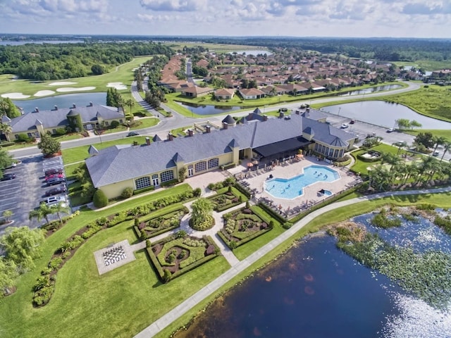 drone / aerial view with a water view