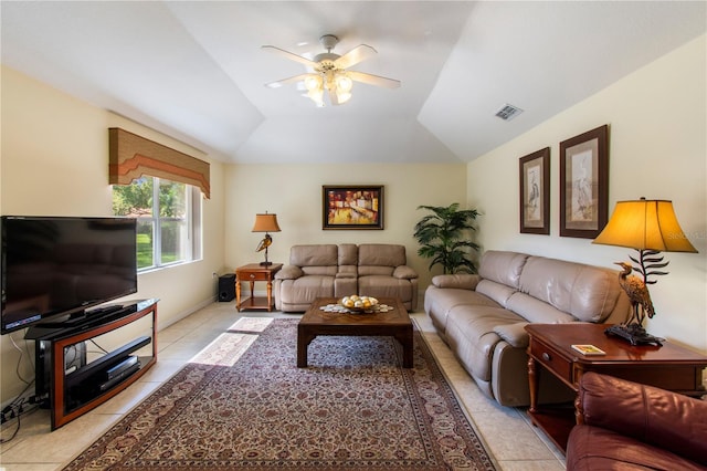 tiled living room with lofted ceiling and ceiling fan