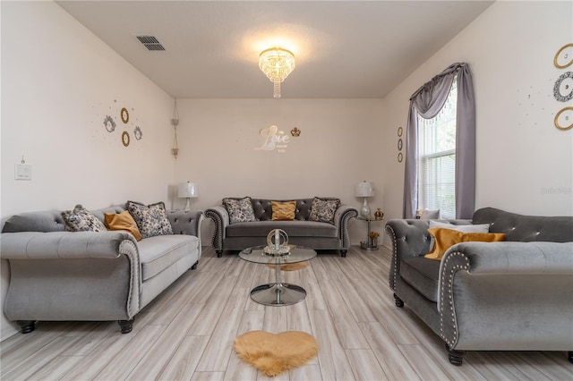 living room with light hardwood / wood-style flooring