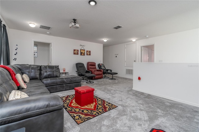 carpeted living room with a textured ceiling