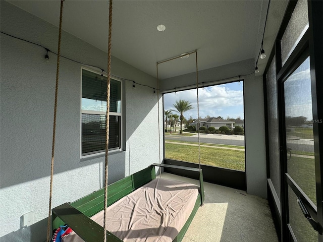 sunroom with plenty of natural light