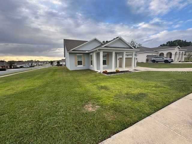 view of front of property with a lawn