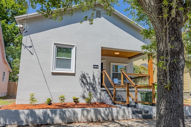 view of front of house with a wooden deck