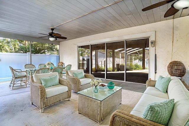 view of patio with outdoor lounge area and ceiling fan