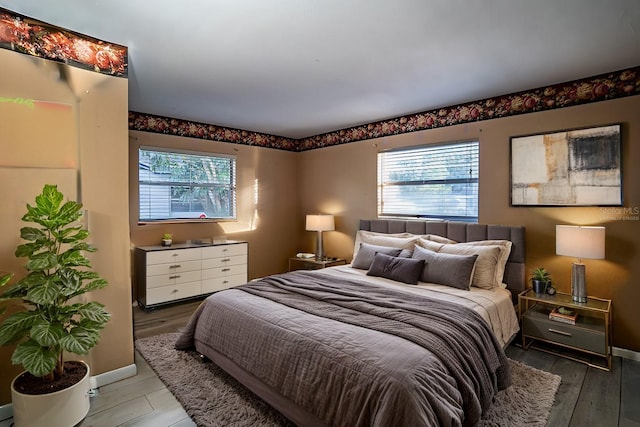 bedroom featuring hardwood / wood-style flooring