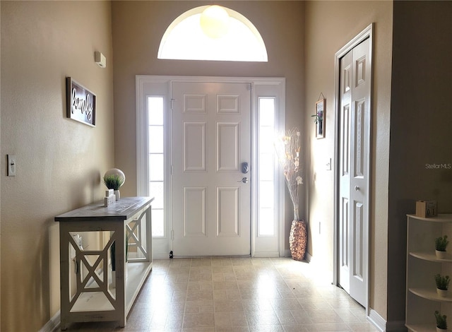 foyer featuring a wealth of natural light