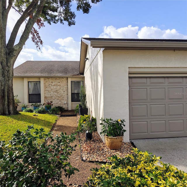 ranch-style home with a garage