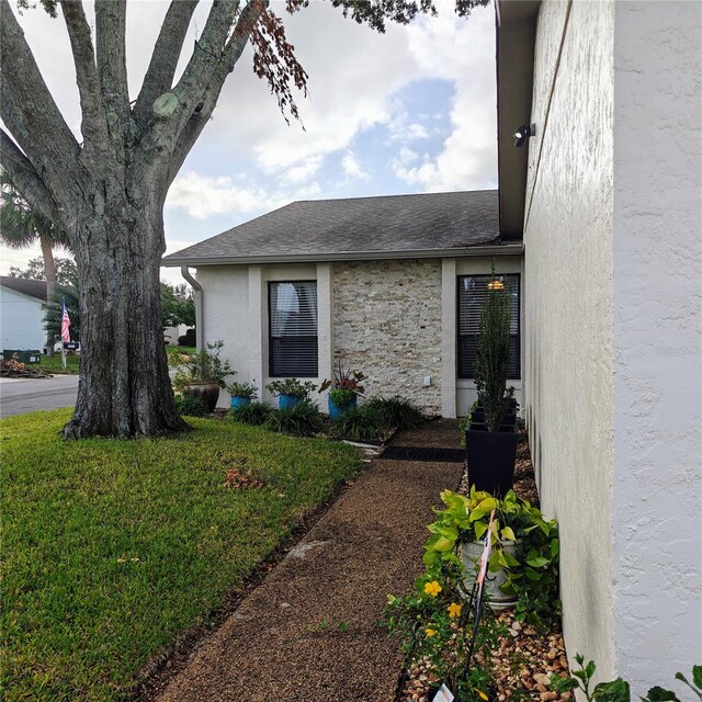 view of front of home with a front lawn