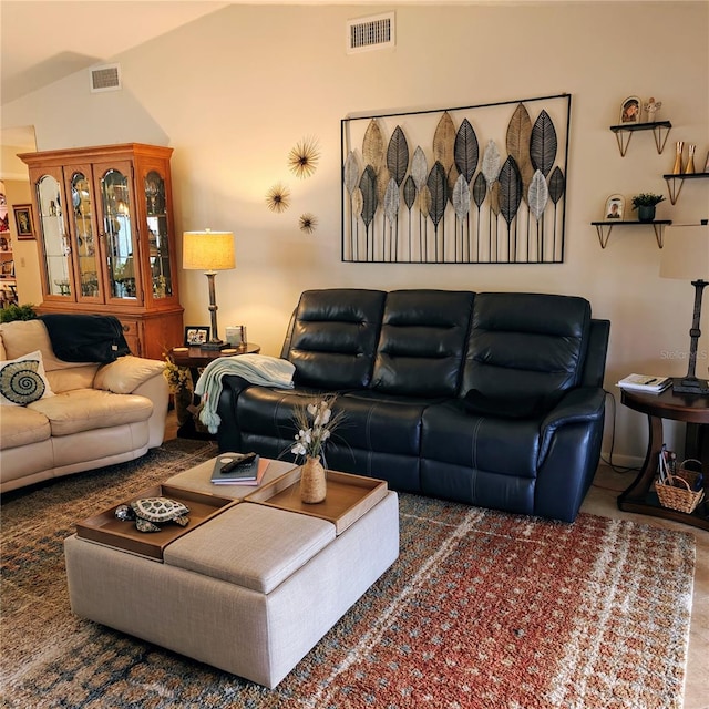 living room with vaulted ceiling