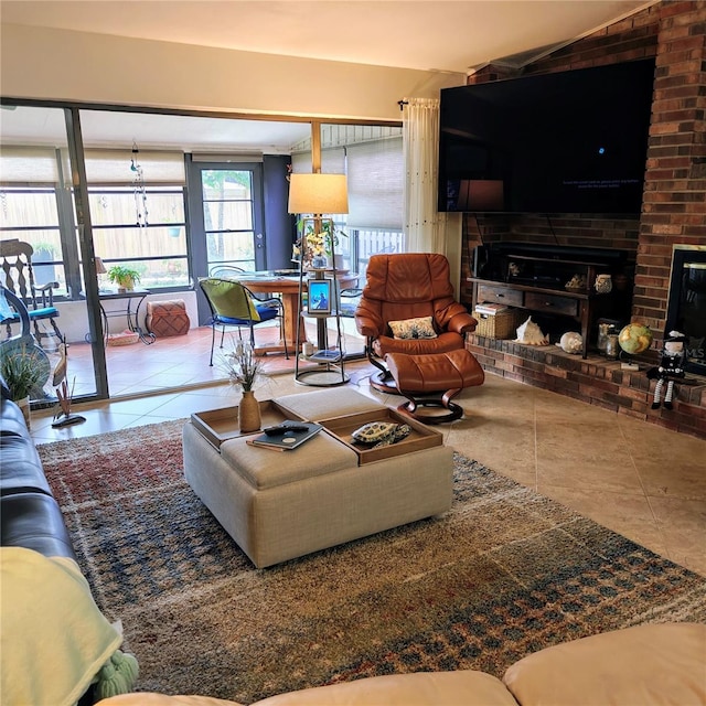 living room with a fireplace and tile patterned flooring