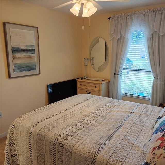 bedroom featuring ceiling fan