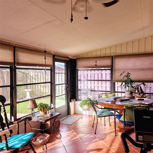 sunroom with lofted ceiling