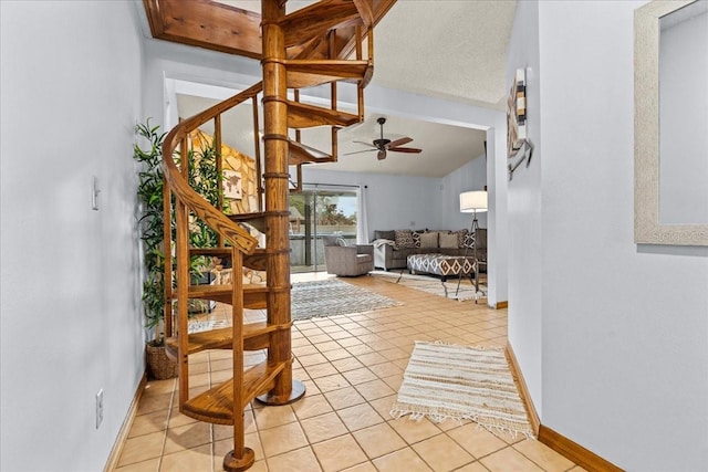 interior space featuring ceiling fan