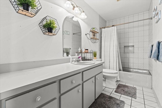 full bathroom with vanity, tile patterned flooring, shower / bath combo, and toilet