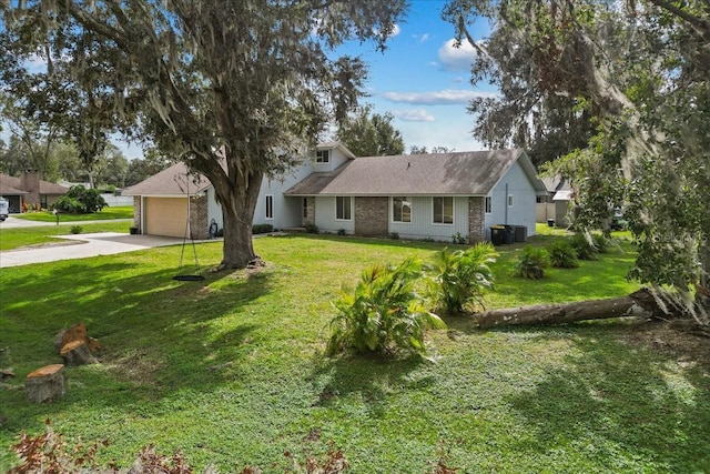 view of front of home featuring a front lawn and a garage