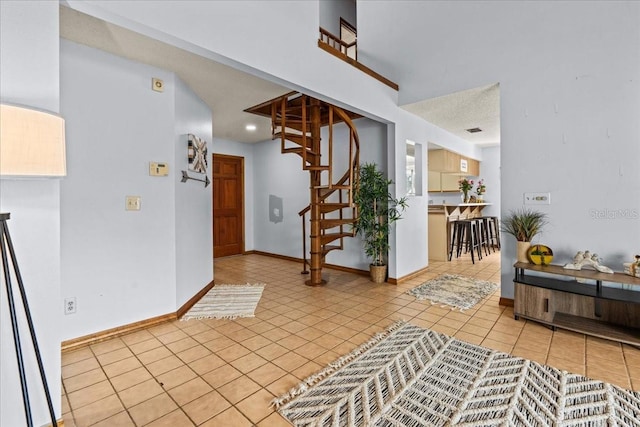 foyer with light tile patterned floors