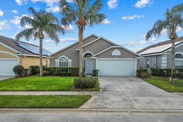 single story home with a garage and a front yard