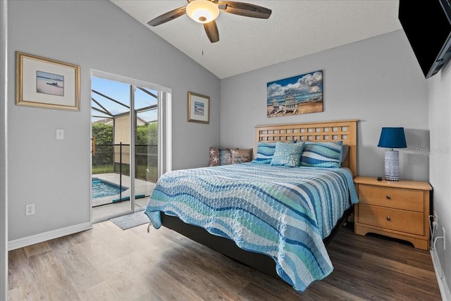 bedroom with a textured ceiling, access to exterior, vaulted ceiling, dark wood-type flooring, and ceiling fan