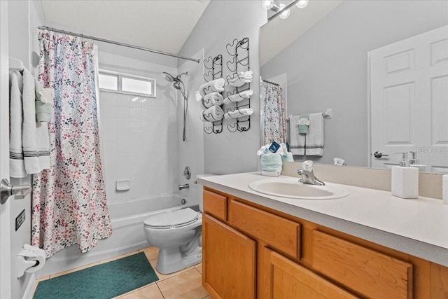 full bathroom featuring toilet, vanity, shower / bath combination with curtain, and tile patterned flooring