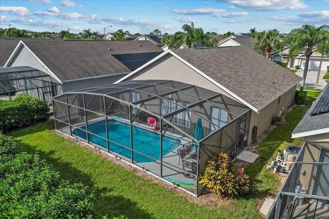 view of pool with a lanai and a patio