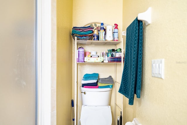 bathroom featuring toilet