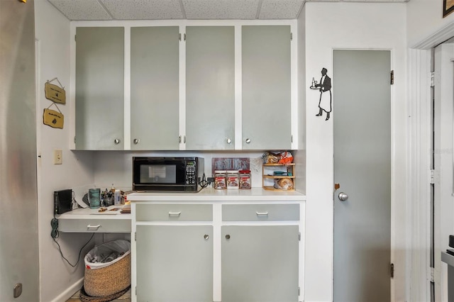 kitchen with a paneled ceiling