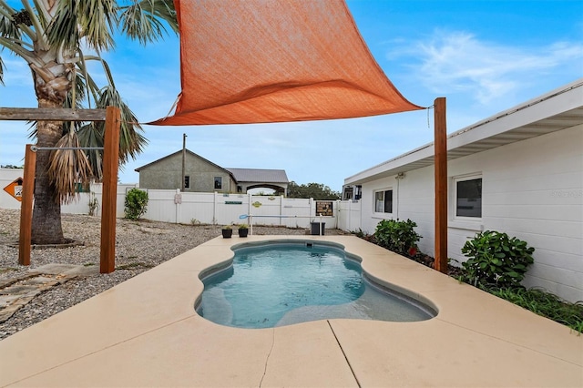 view of swimming pool featuring a patio