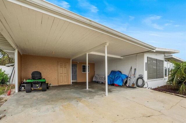 view of patio / terrace with a carport