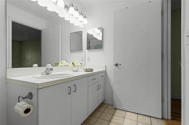 bathroom with vanity and tile patterned floors