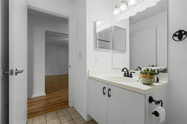 bathroom featuring vanity and wood-type flooring