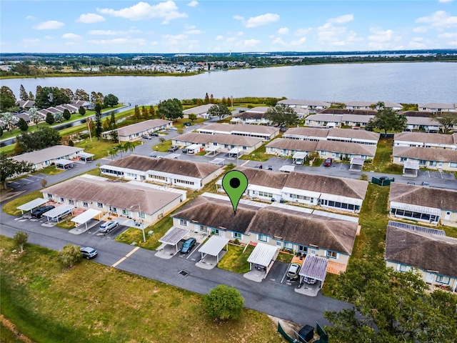 drone / aerial view with a water view