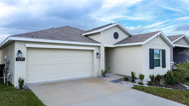 ranch-style home with a garage