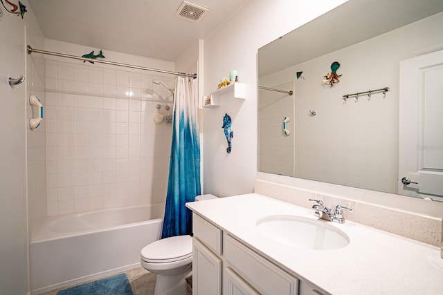 full bathroom with shower / tub combo with curtain, vanity, and toilet