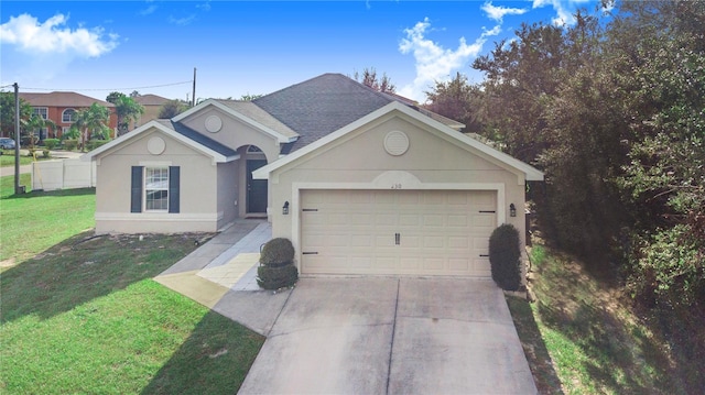 single story home featuring a garage and a front yard