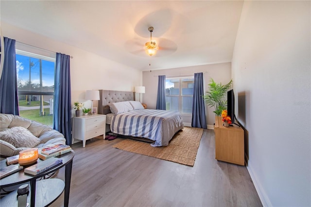 bedroom featuring ceiling fan and light wood-type flooring