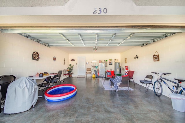 garage featuring electric water heater