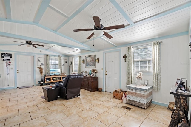 tiled living room featuring vaulted ceiling with beams and wood ceiling