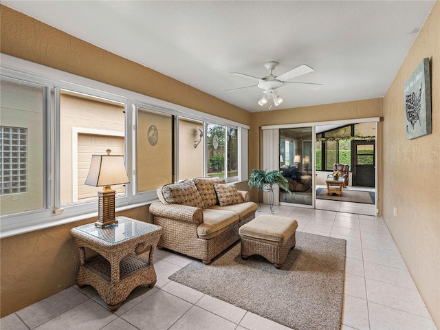 sunroom / solarium with plenty of natural light and ceiling fan