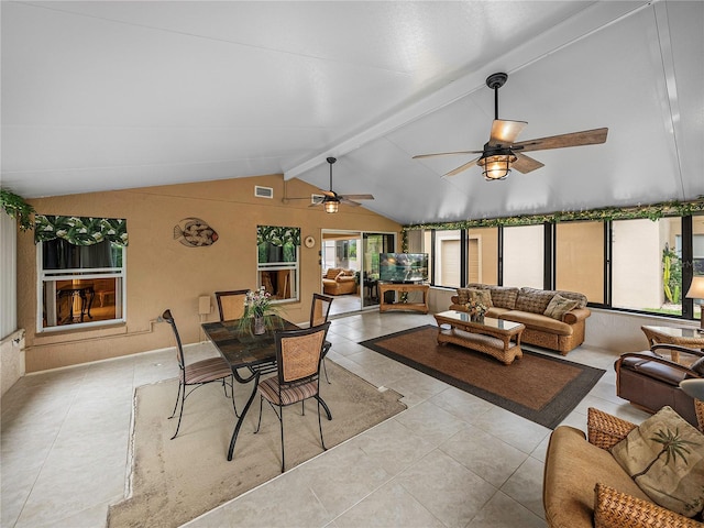 interior space with vaulted ceiling with beams and ceiling fan