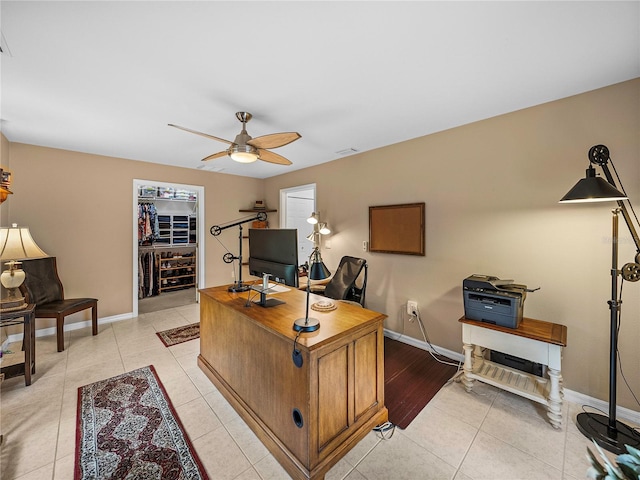 office area featuring light tile patterned floors and ceiling fan