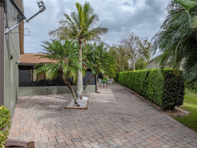 view of property's community with a patio