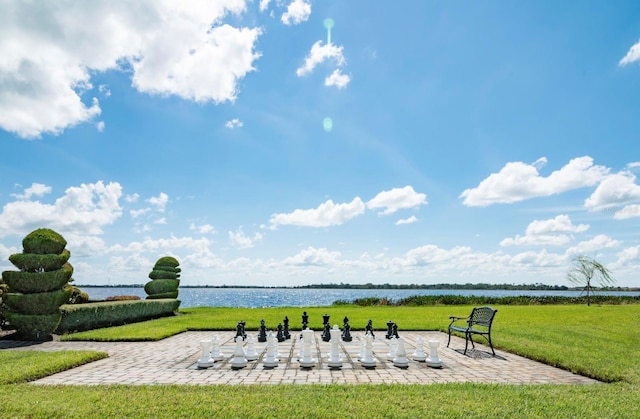 view of patio / terrace featuring a water view