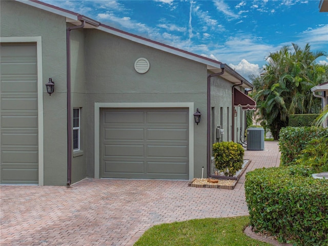 garage with central AC unit