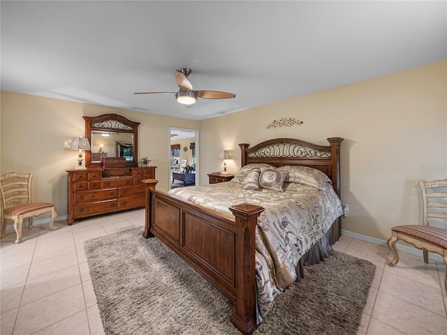 bedroom featuring light tile patterned flooring and ceiling fan