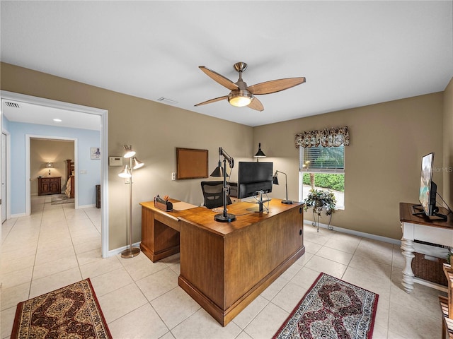 office featuring light tile patterned flooring and ceiling fan