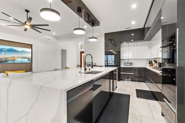 193 Stargrass Dr, Auburndale, FL 33823 - kitchen featuring ceiling fan, modern cabinets, a sink, recessed lighting, and pendant lighting